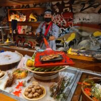 Chefs handing the food at Yankii Robatayaki Restaurant Bangkok